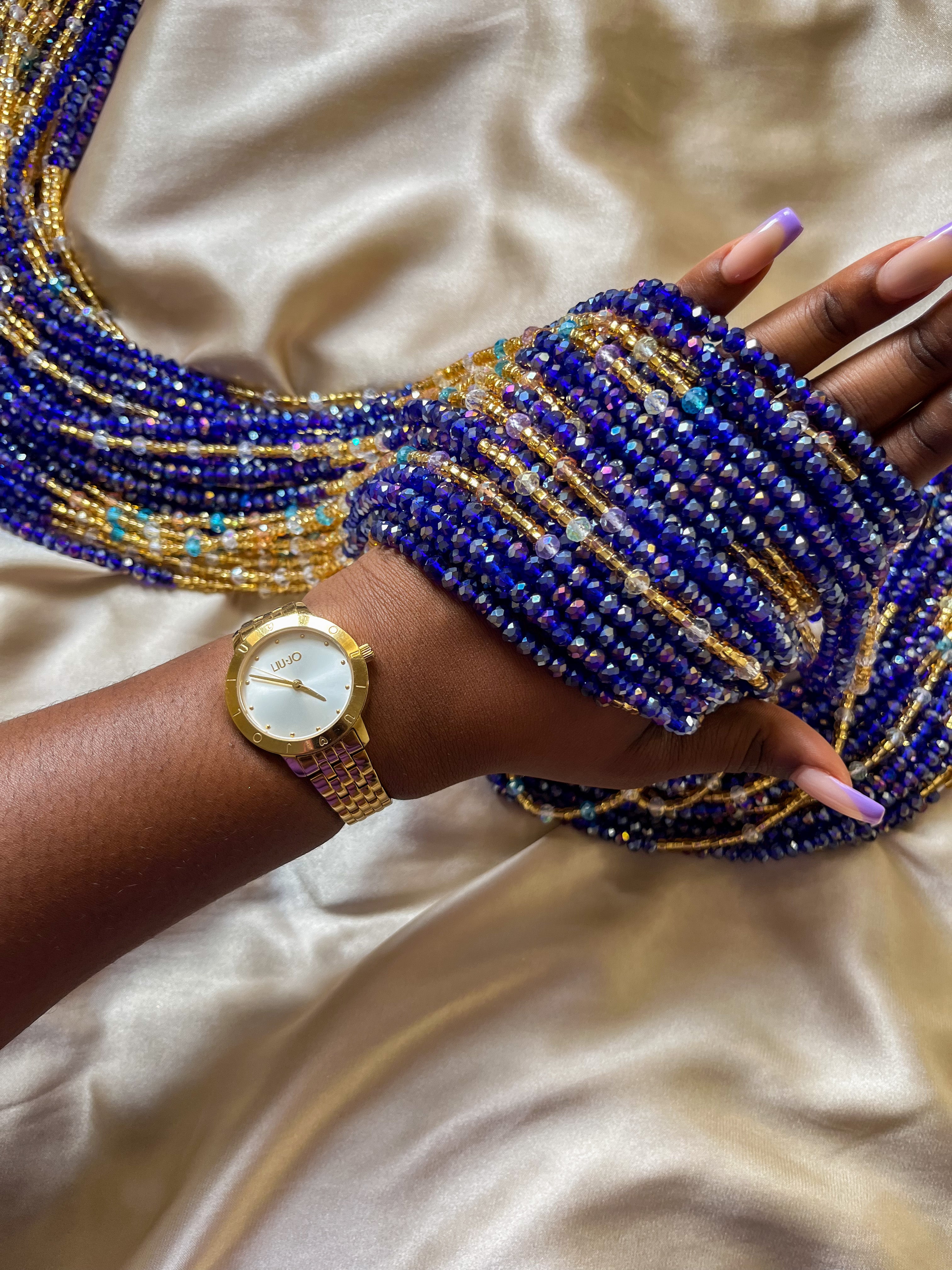 deep blue and gold african waist beads. top view